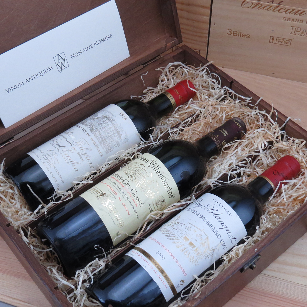 Three bottles wooden box with engraving